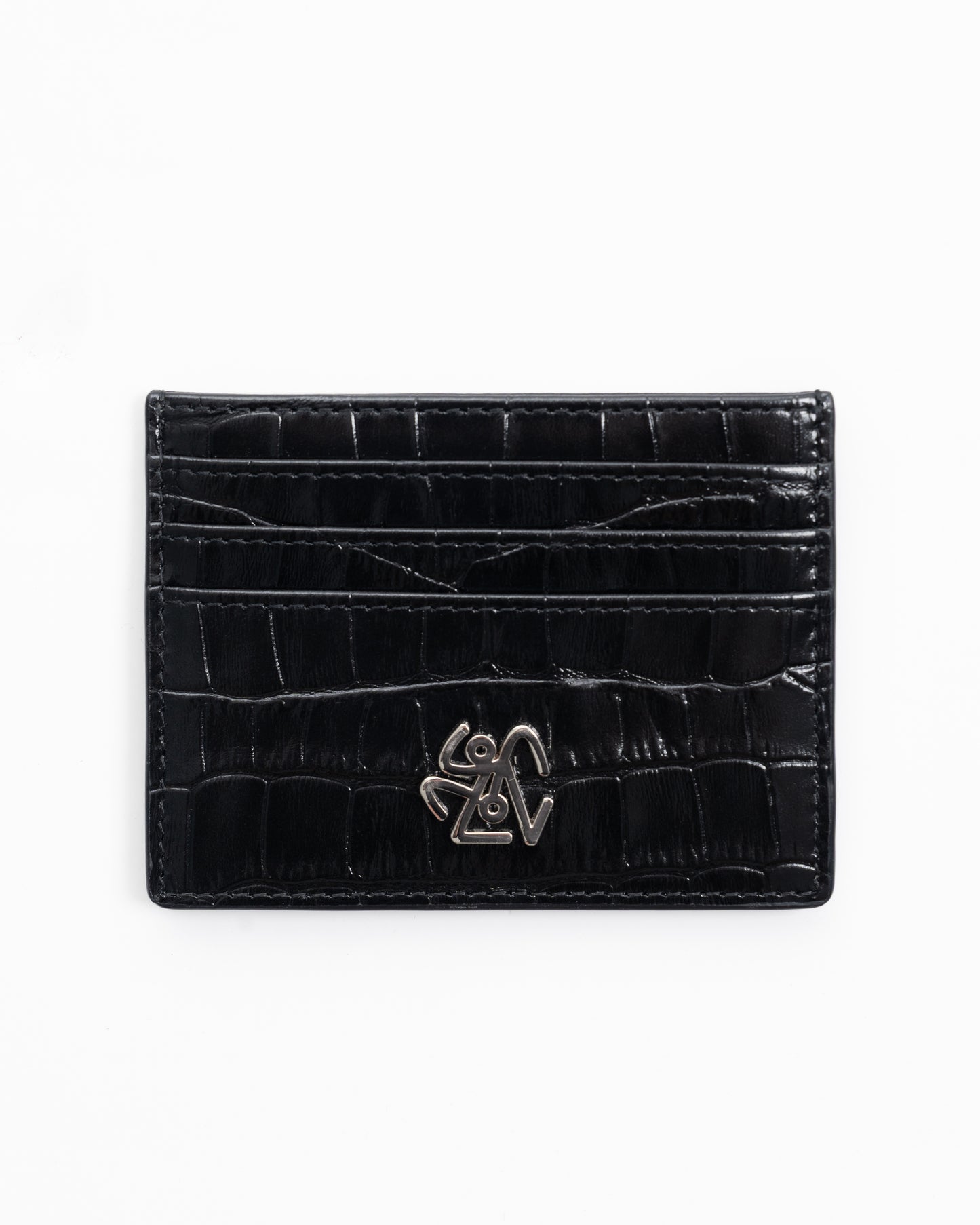 Black crocodile skin cardholder with a silver logo on a white background